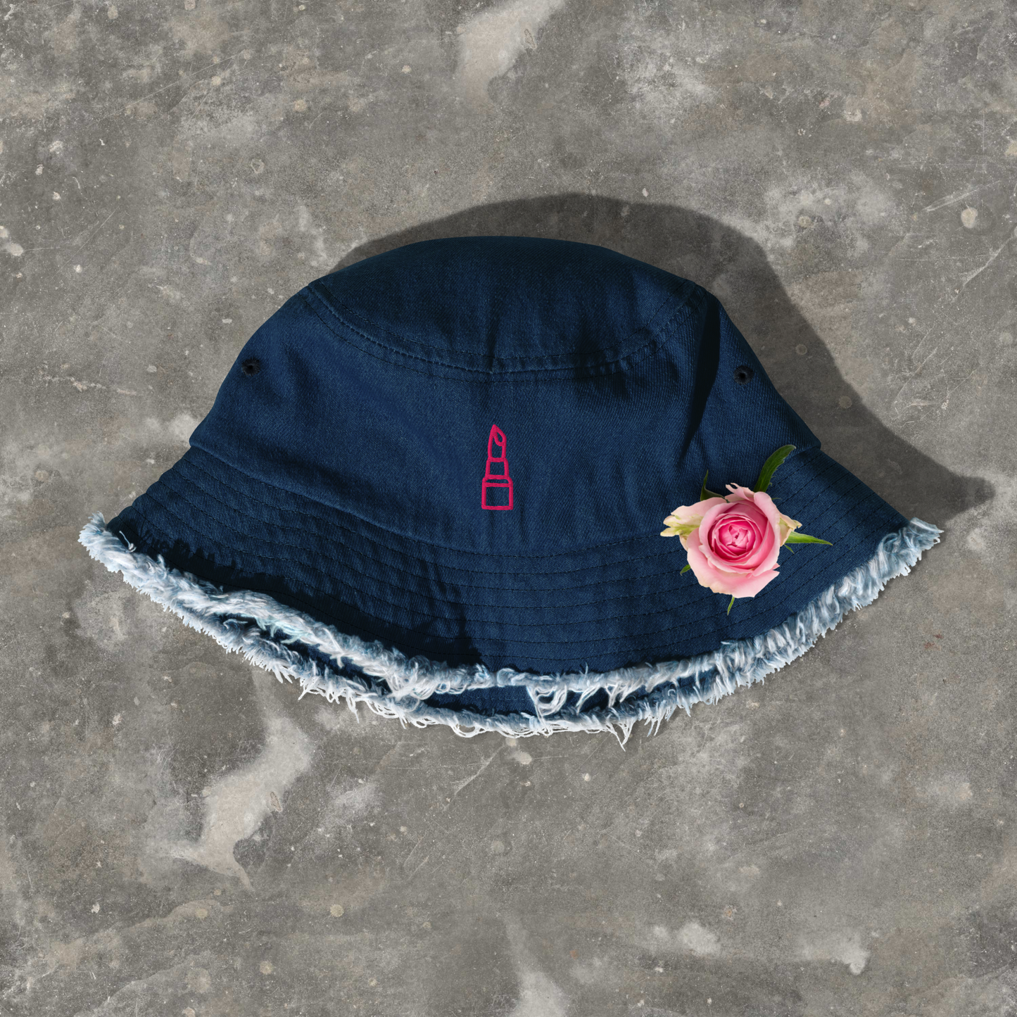 Hot pink women’s distressed denim bucket hat.