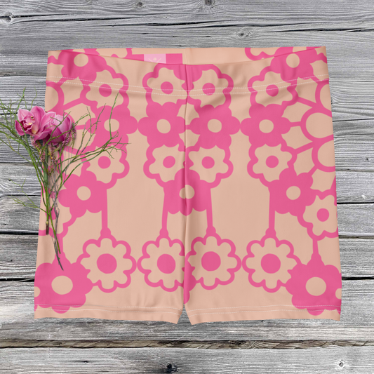 Light tan and hot pink women’s shorts.