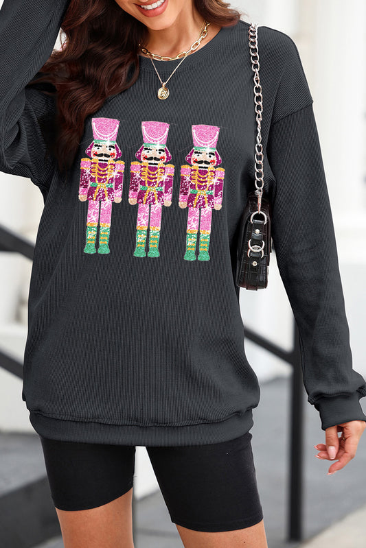 Holiday multi-color 3 nutcracker long sleeve women’s sweater.