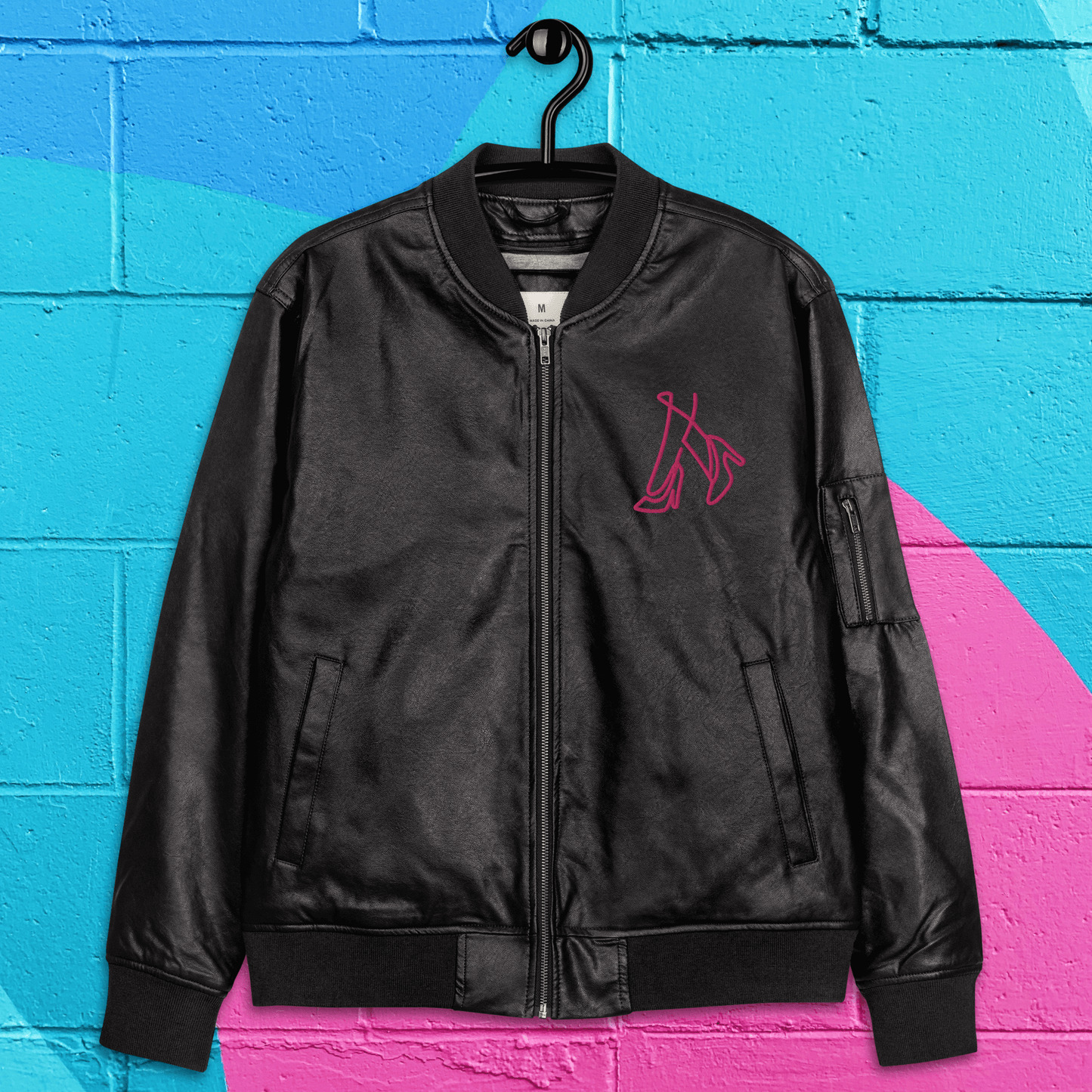 Leather black and hot pink women’s bomber jacket.