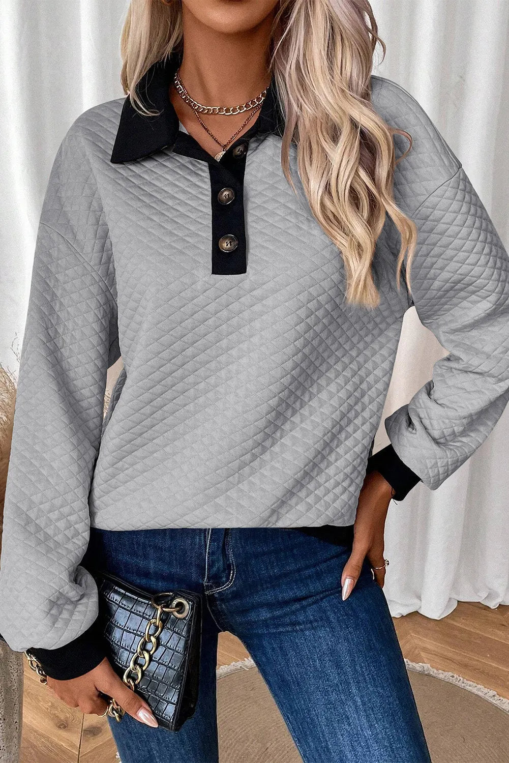 Textured collar button up women’s sweater.