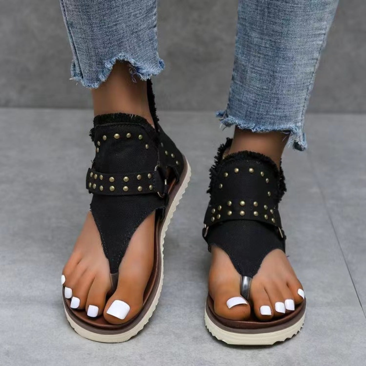 Denim studded raw hem women’s sandals.