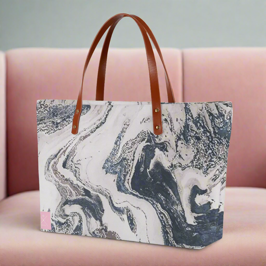 Large gray and white cloth tote bag.