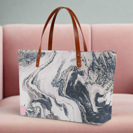 Large gray and white cloth tote bag.