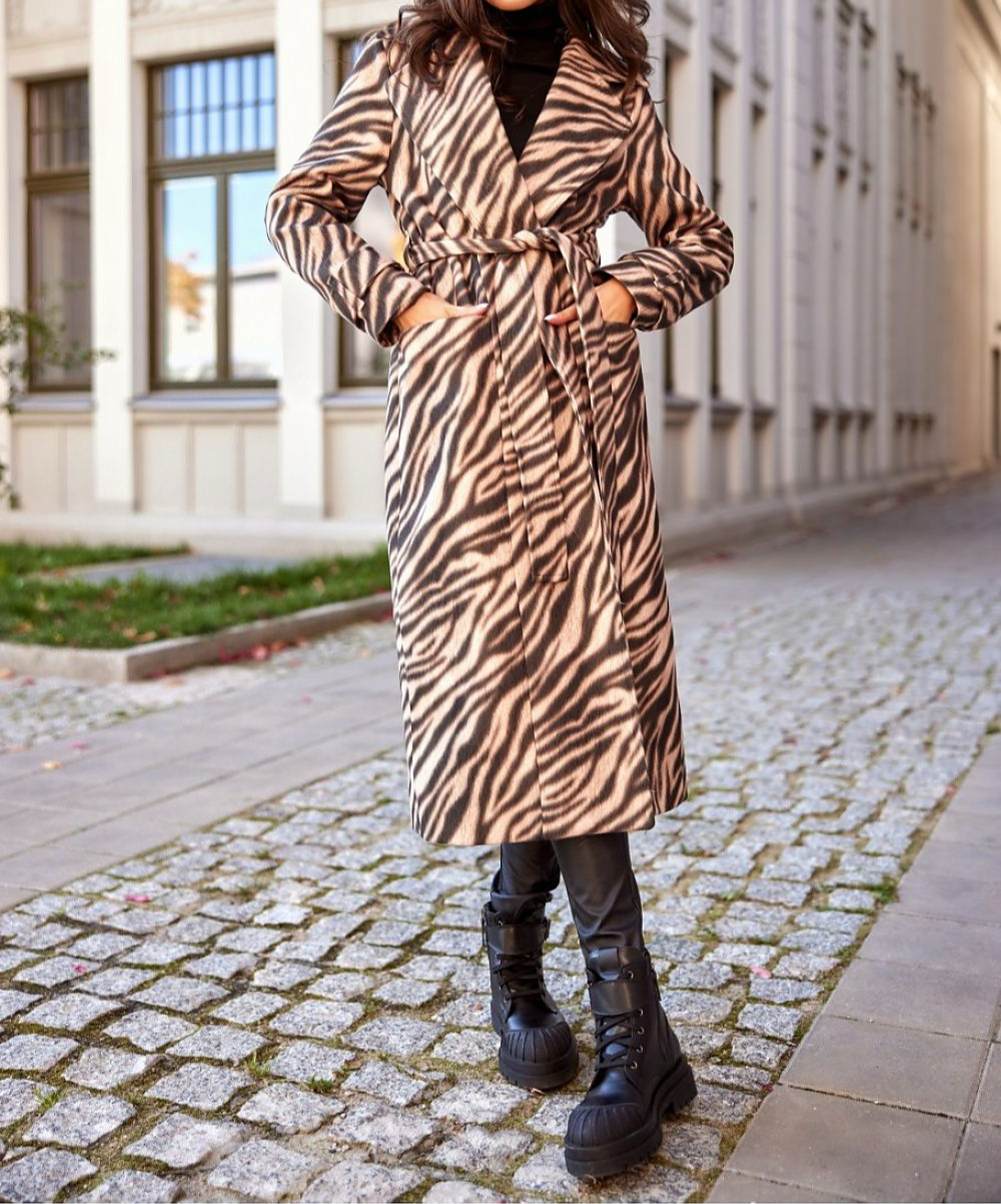 Tan and brown long women’s coat.