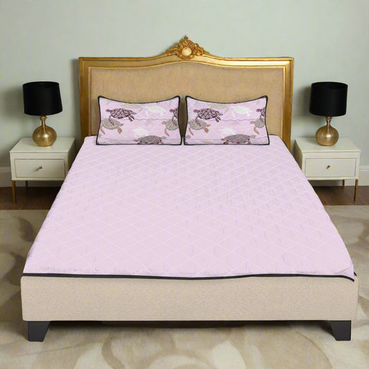 Lilac and black quilted bedding set.