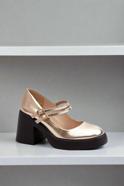 Golden block women’s heel pumps.