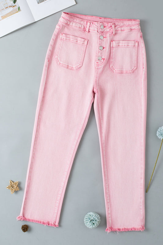 Denim blush pink raw hem women’s jeans with pockets.