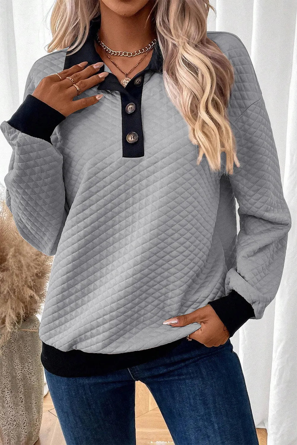 Textured collar button up women’s sweater.