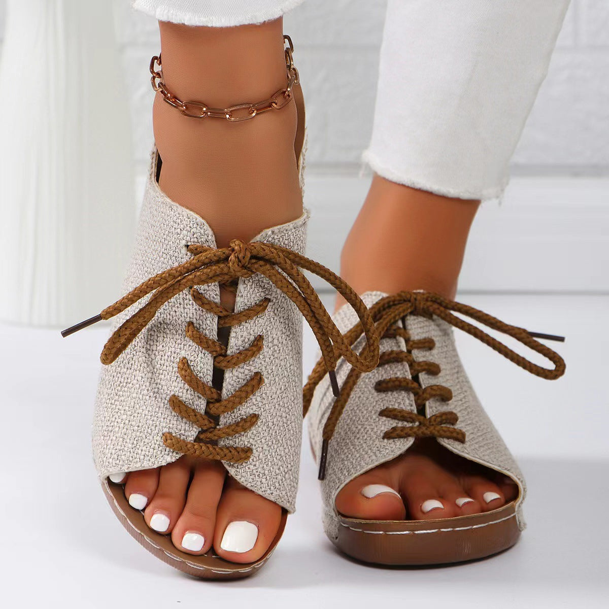 Laced wedge women’s sandals.