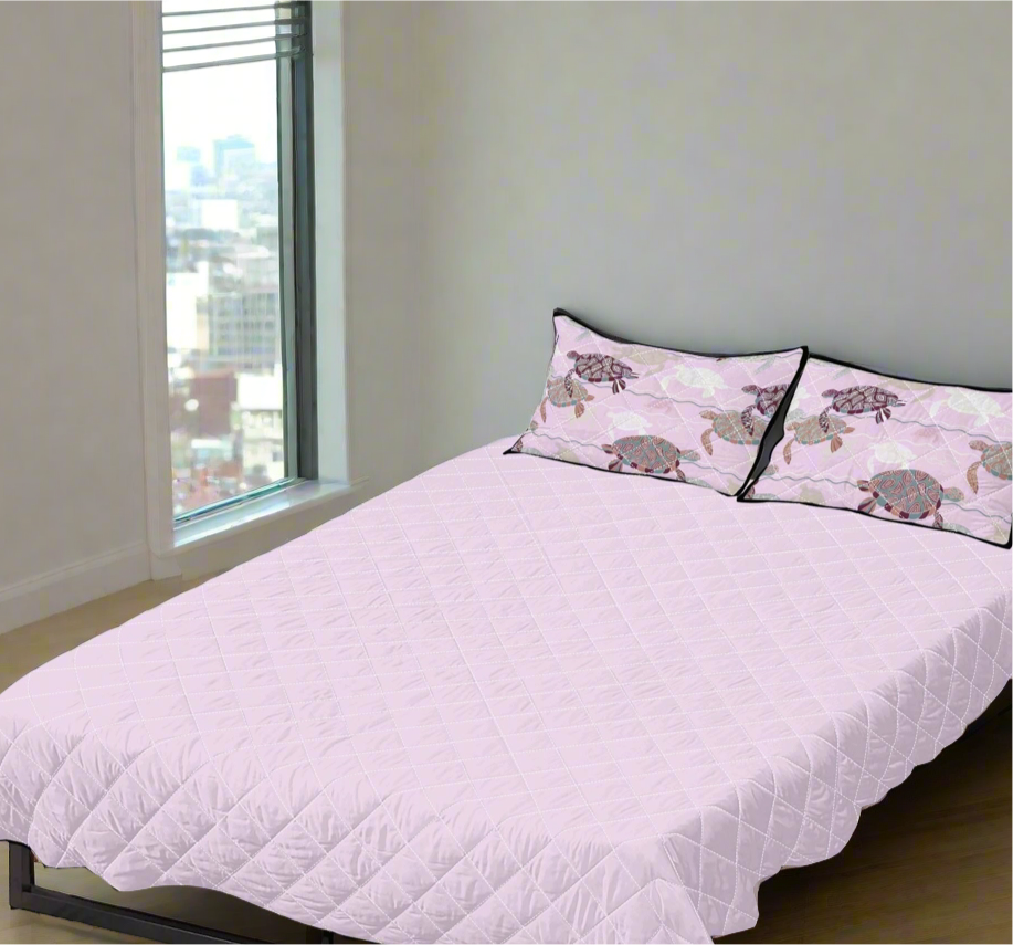 Lilac and black quilted bedding set.