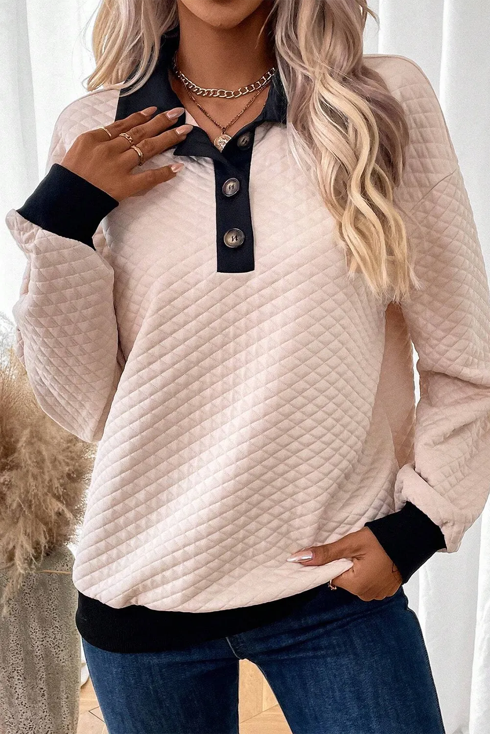 Textured collar button up women’s sweater.