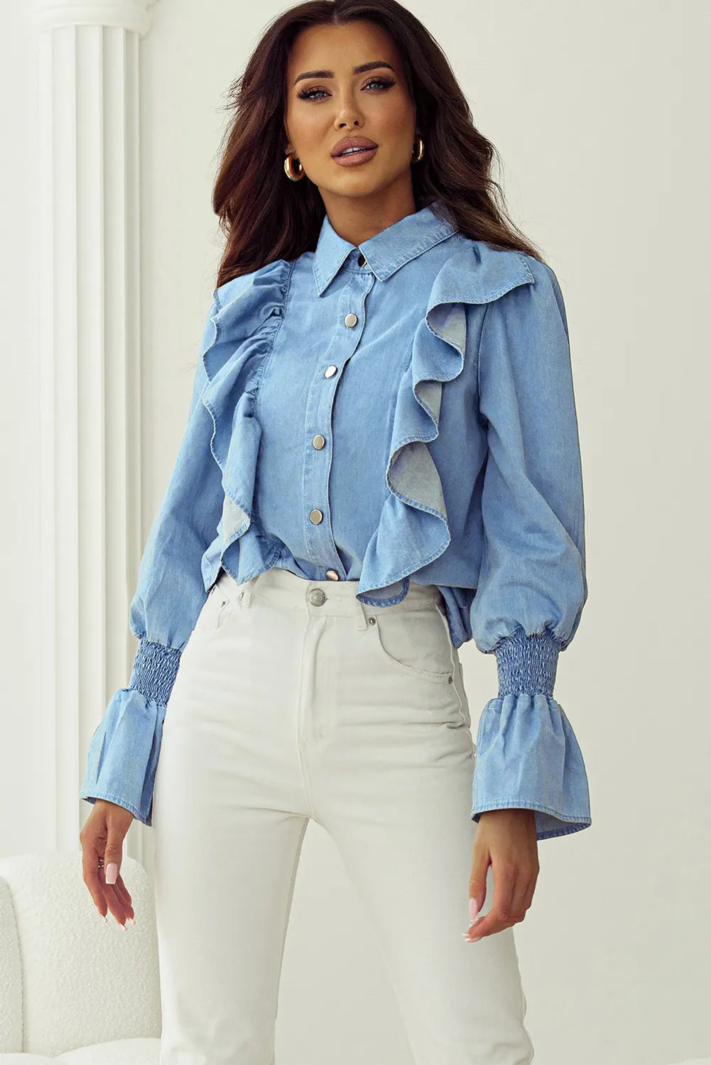 Ruffled denim button up women’s top.