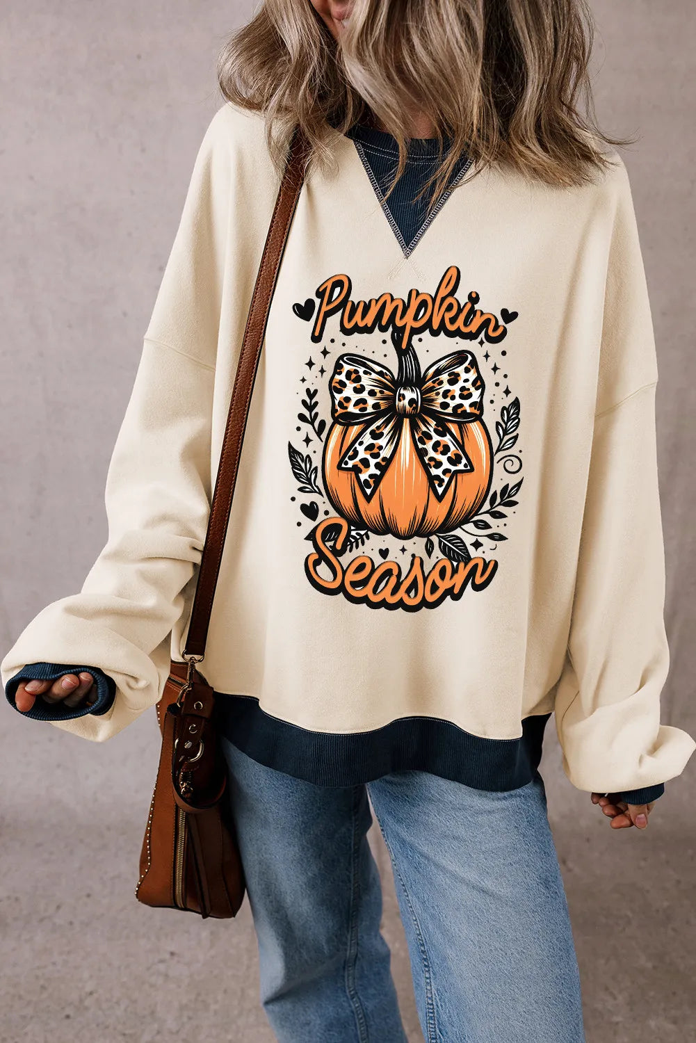 Pumpkin season bow women’s sweatshirt.