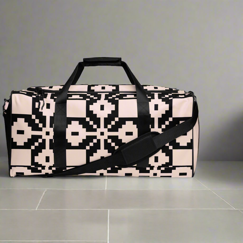 Light pink and black duffle bag.