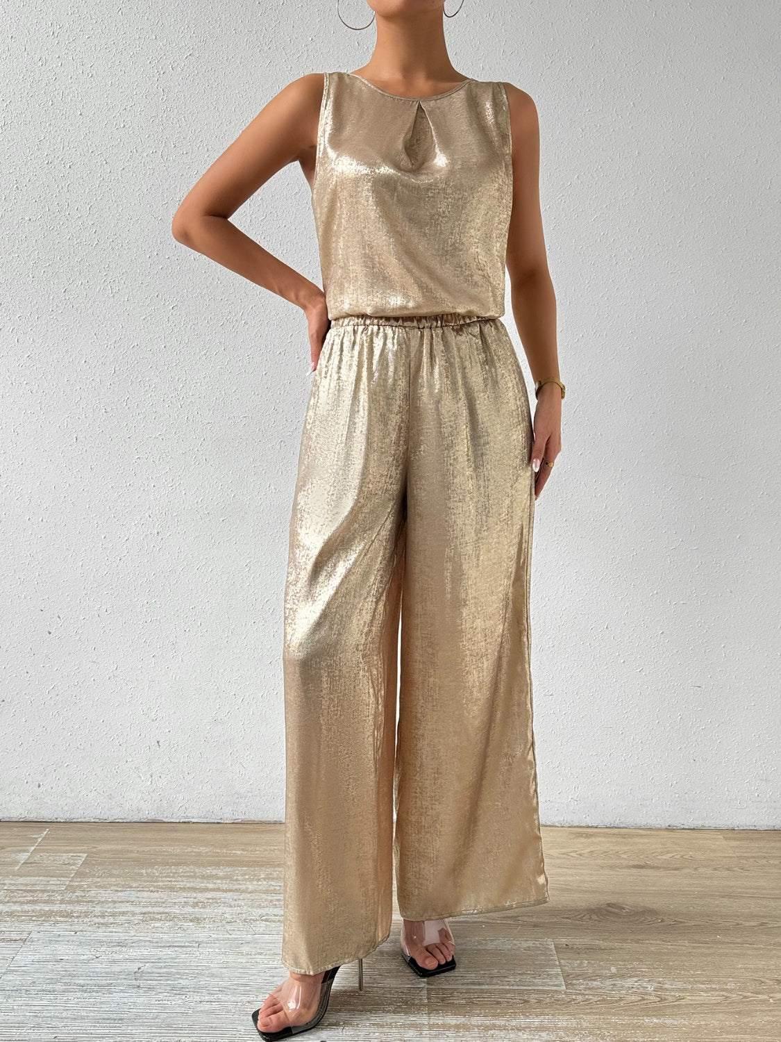 Golden women’s sleeveless two piece set.