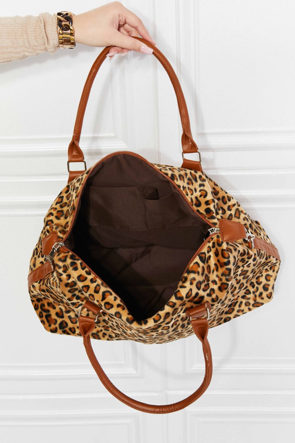 Faux fur animal brushed weekender handbag.