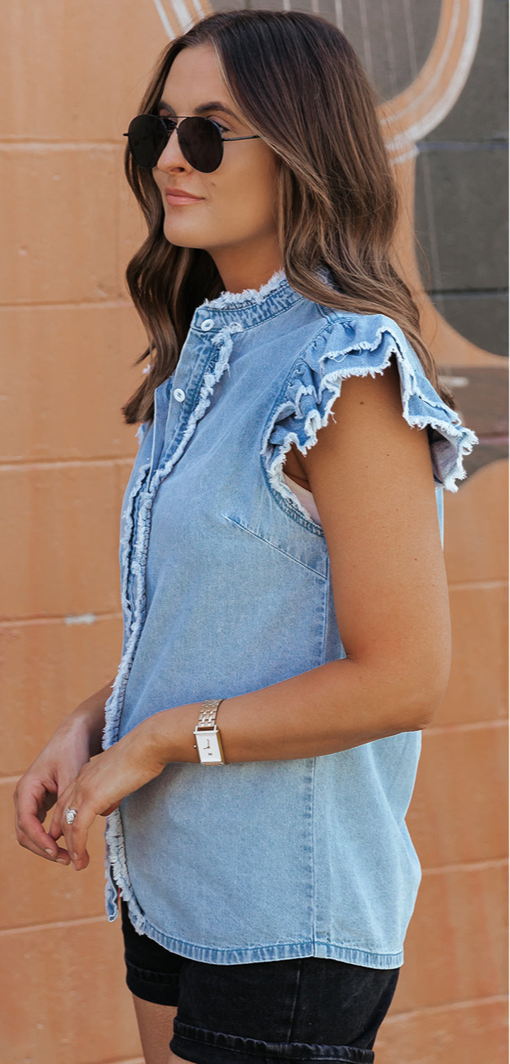 Denim button up women’s top.