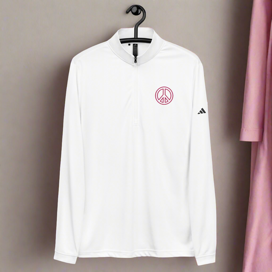 Jersey adidas con cremallera de un cuarto en blanco neutro y rosa fuerte.