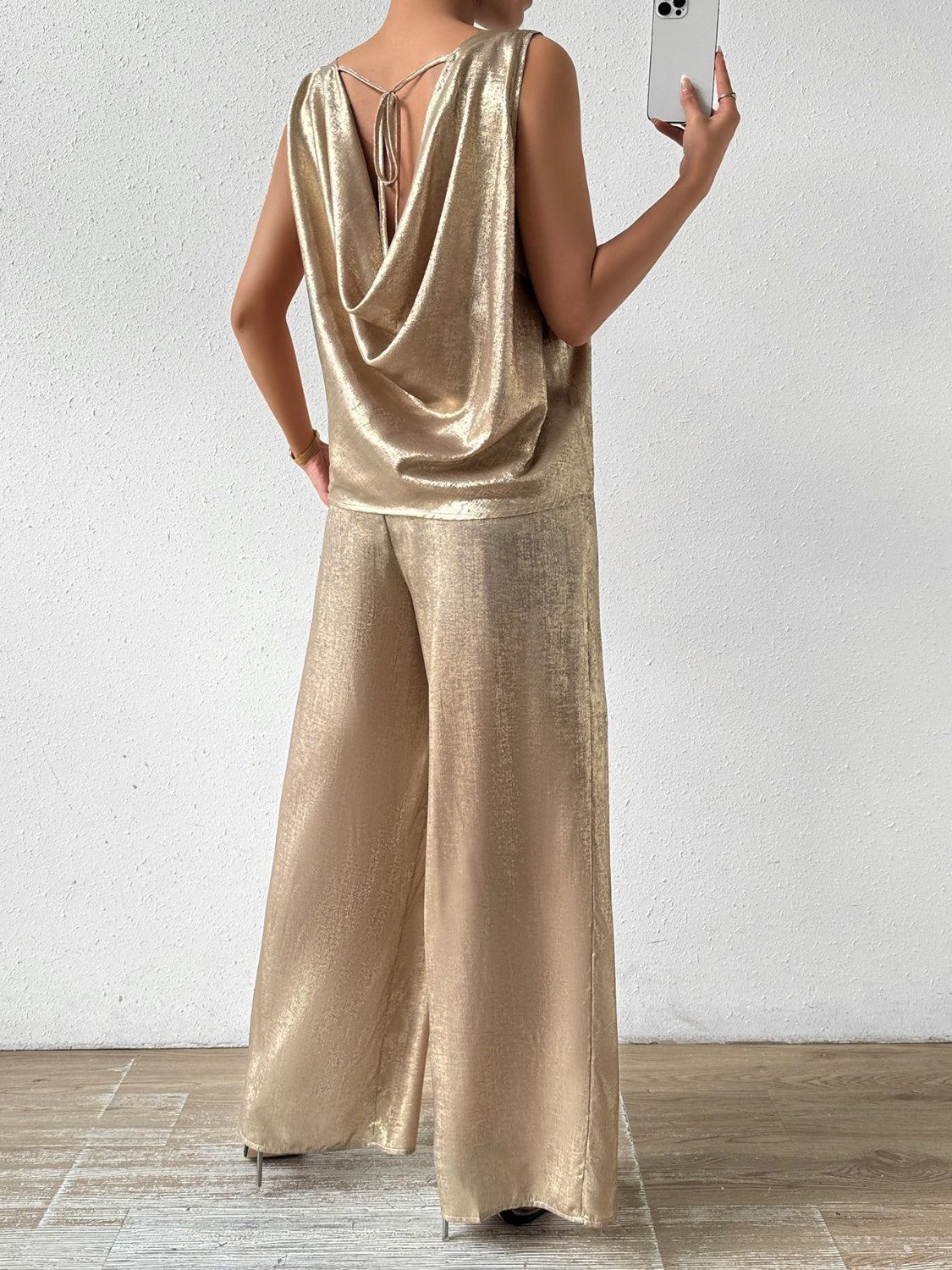 Golden women’s sleeveless two piece set.