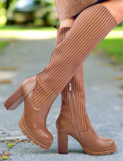 Brown leatherette women’s tall wide heel boots.