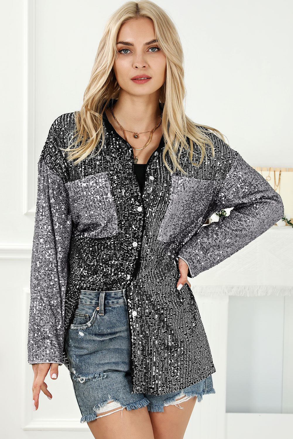 Sequin button-up pocketed long sleeve women’s top.