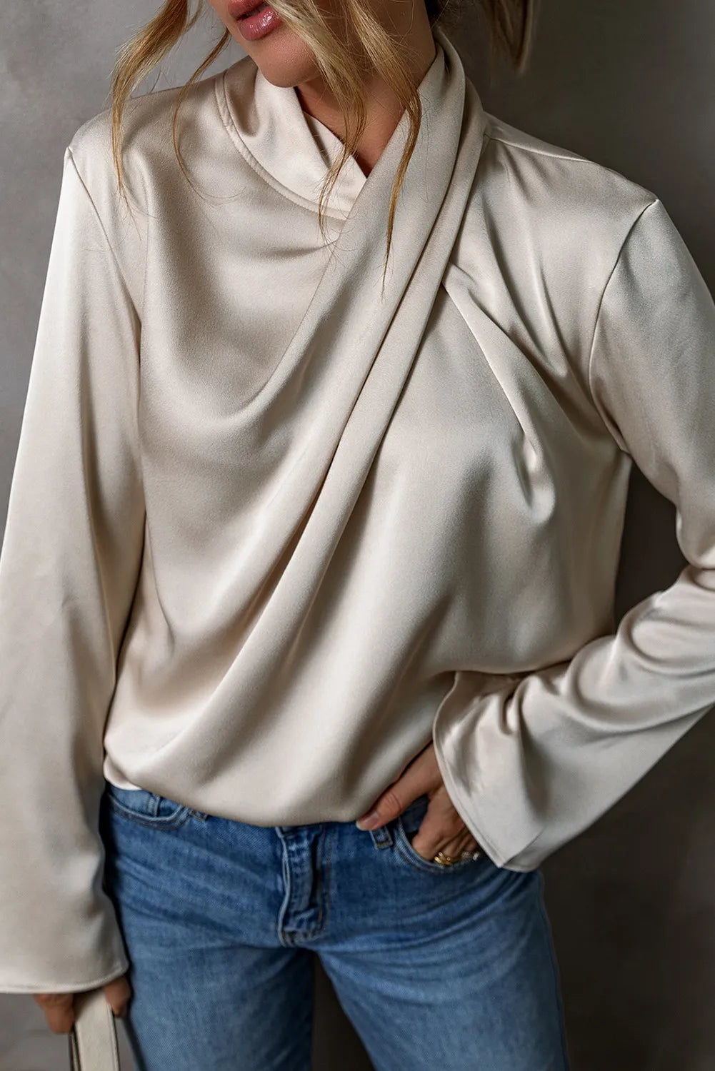 Ivory cutout ruched long sleeve women’s blouse.