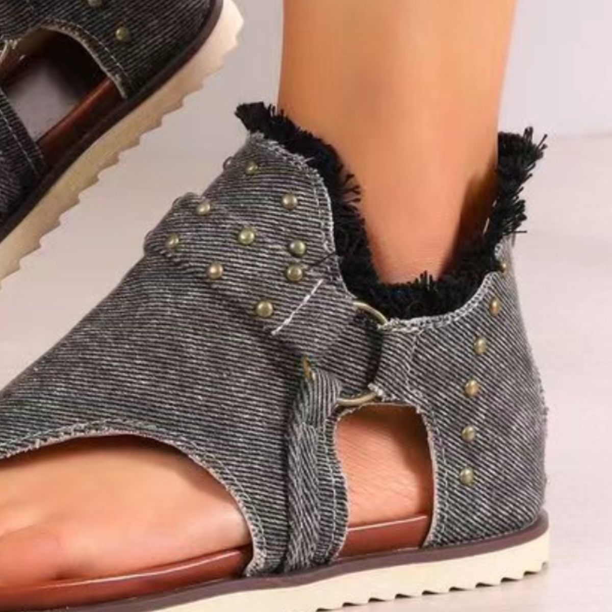 Denim studded raw hem women’s sandals.