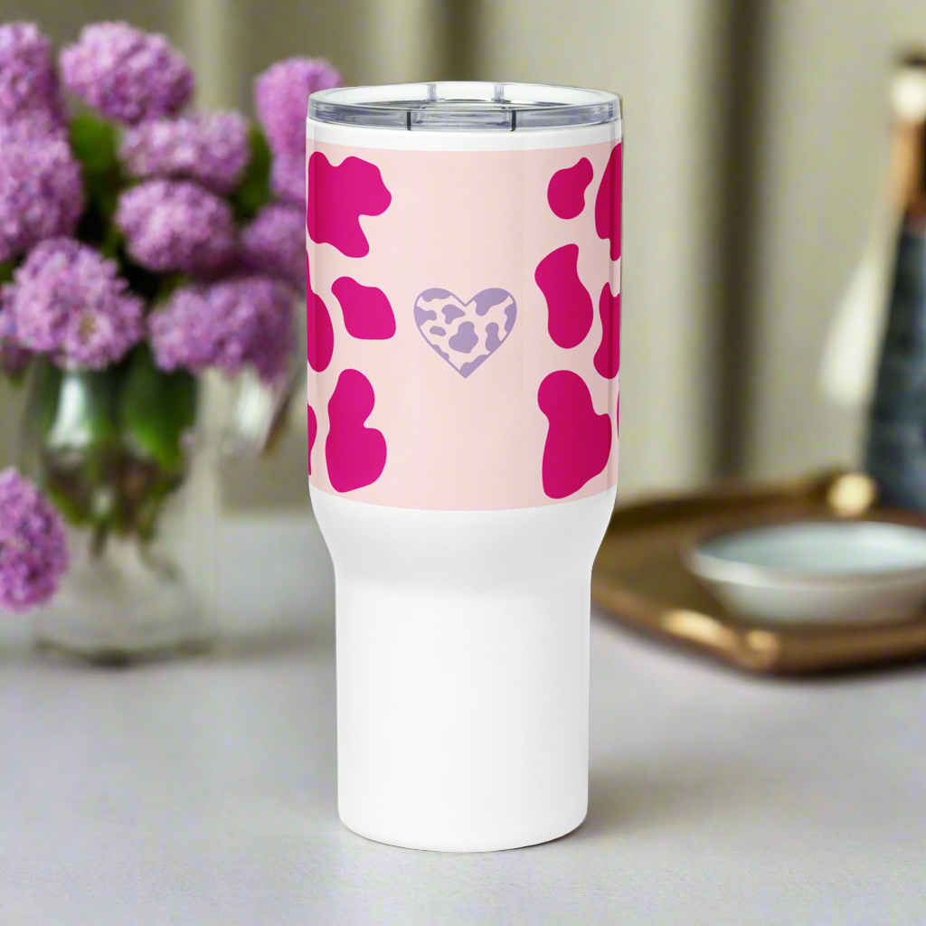 Hot pink animal travel mug with a handle.