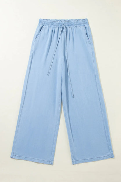 Drawstring denim pocketed women’s palazzo pants.