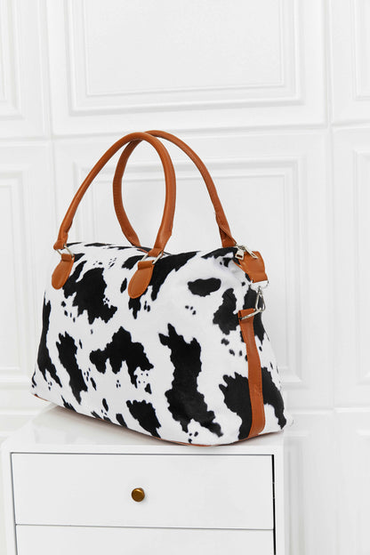 Faux fur animal brushed weekender handbag.