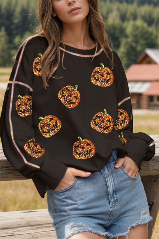 Sequin black and orange pumpkin women’s sweatshirt.