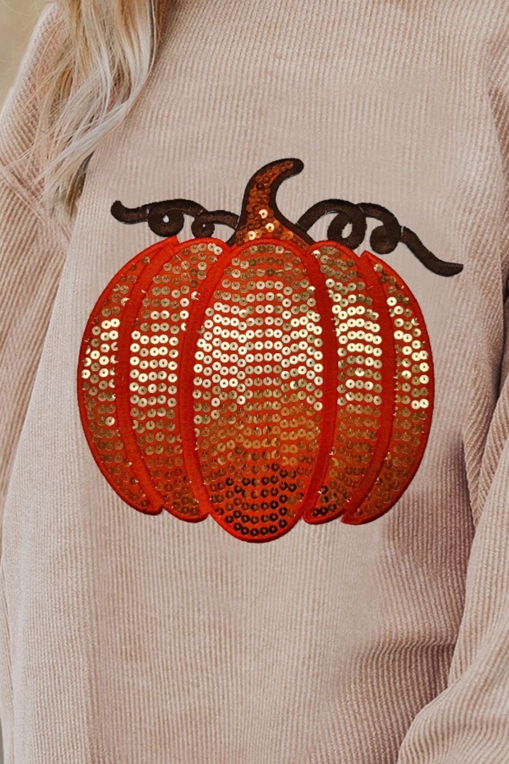 Pumpkin sequin women’s long sleeve sweatshirt.