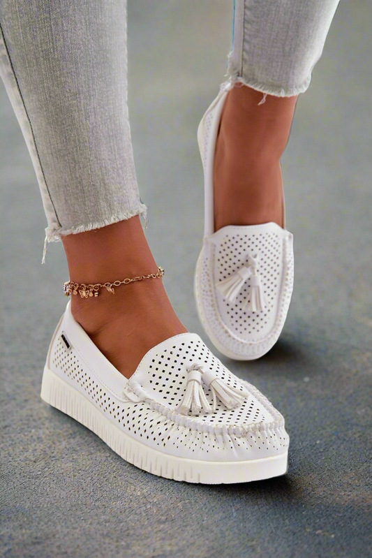 Mocassin pour femme en éco-cuir blanc.