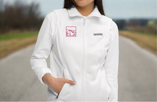 White and hot pink women’s columbia fleece vest.