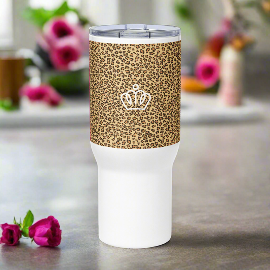 Cheetah and fuchsia back style travel mug with a handle.