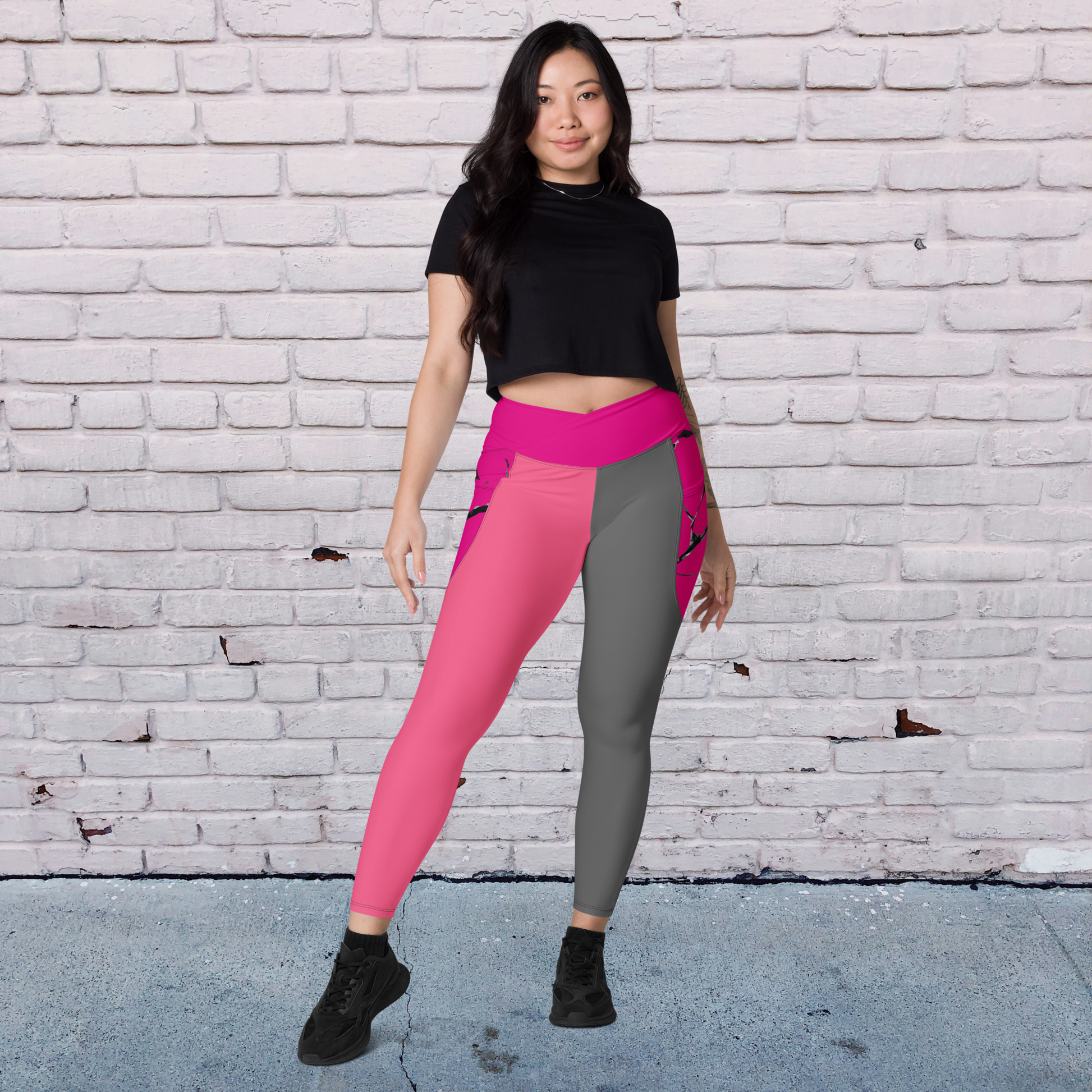 Fuchsia and gray women’s crossover leggings with pockets.