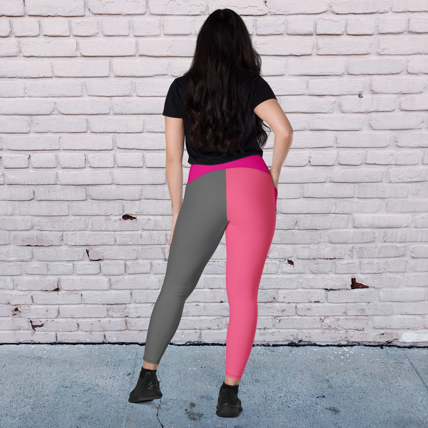Fuchsia and gray women’s crossover leggings with pockets.