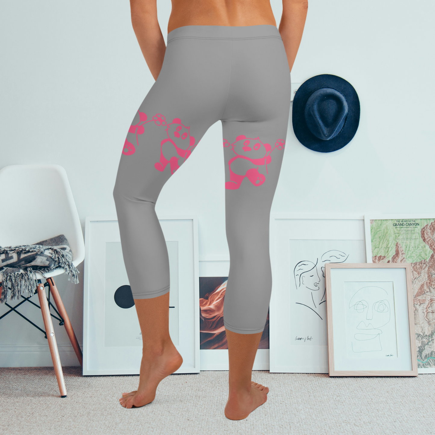 Gray and pink women’s panda capri leggings.