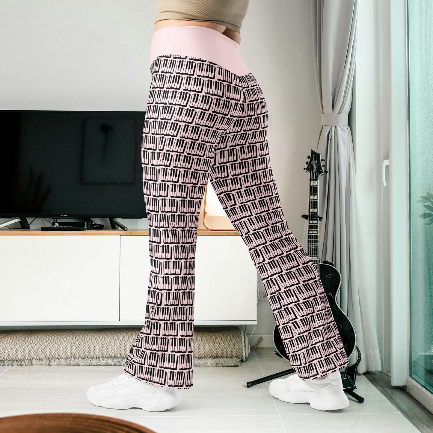 Black and pink piano women’s flare leggings.