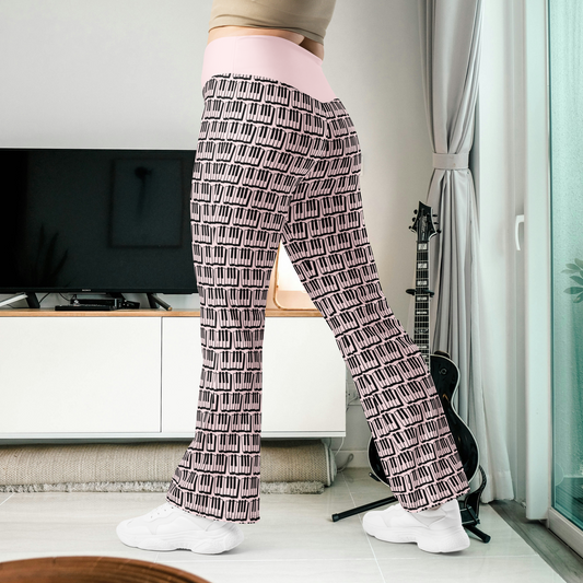 Leggings acampanados de piano para mujer en negro y rosa.