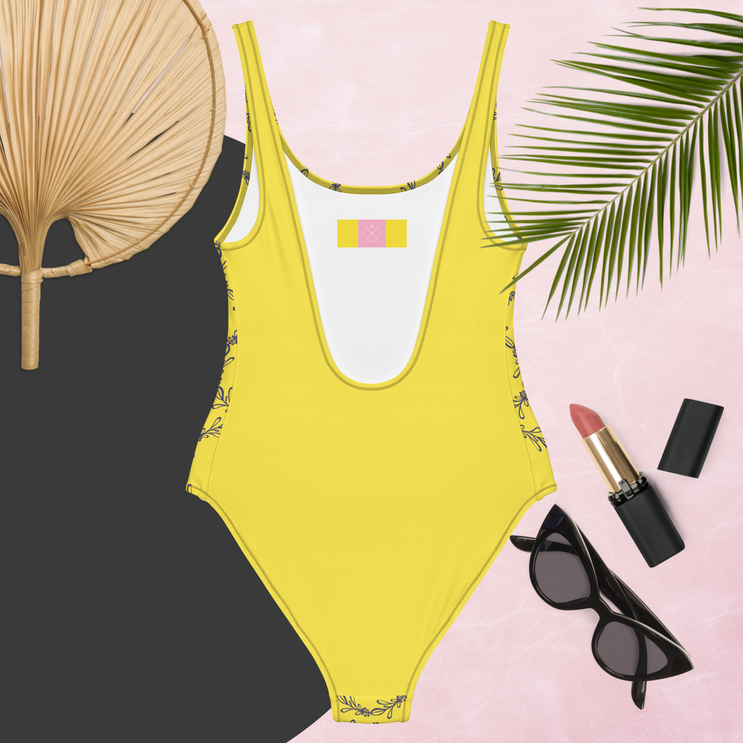 Yellow and gray women’s one-piece swimsuit.