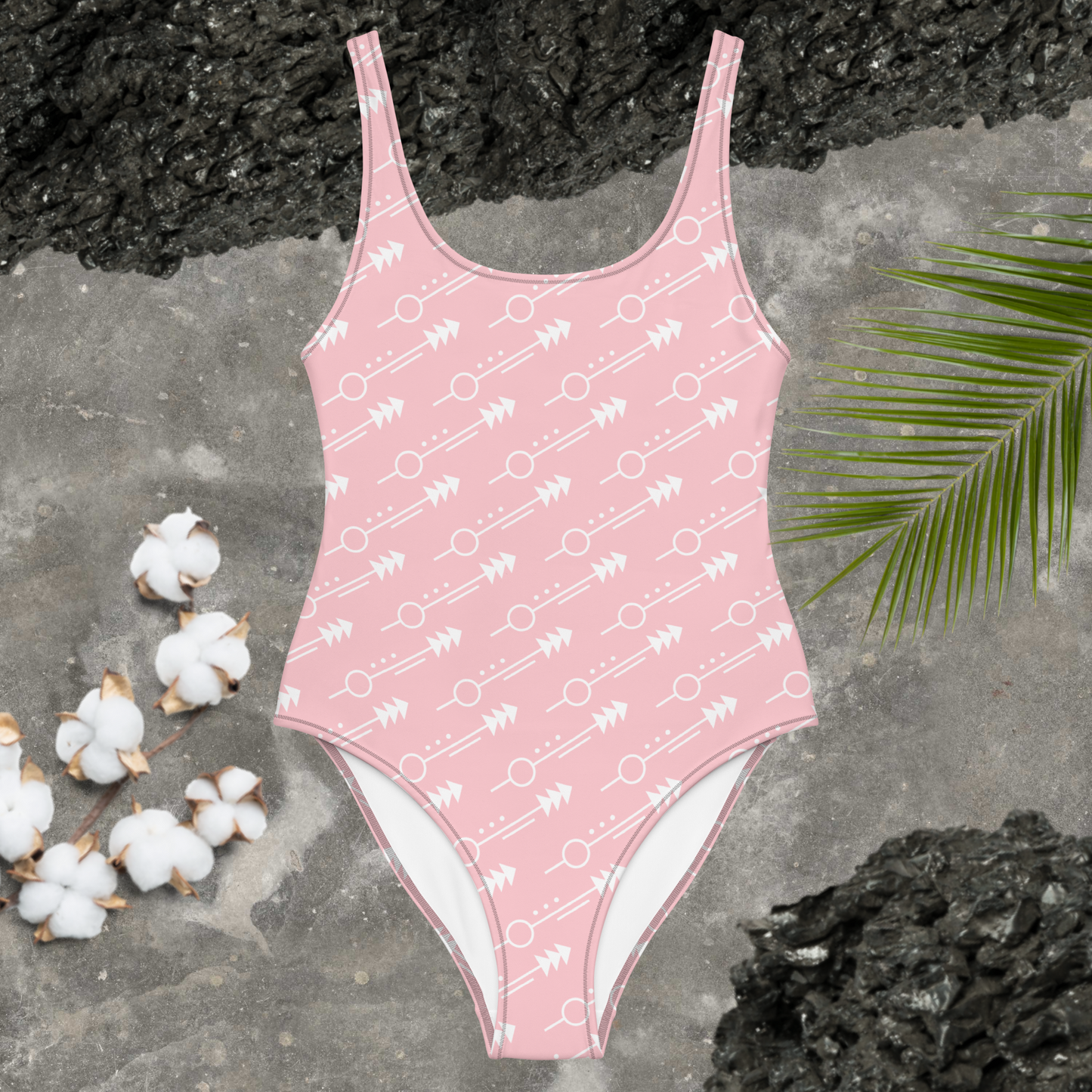 Maillot de bain une pièce femme flèche rose clair et blanche.