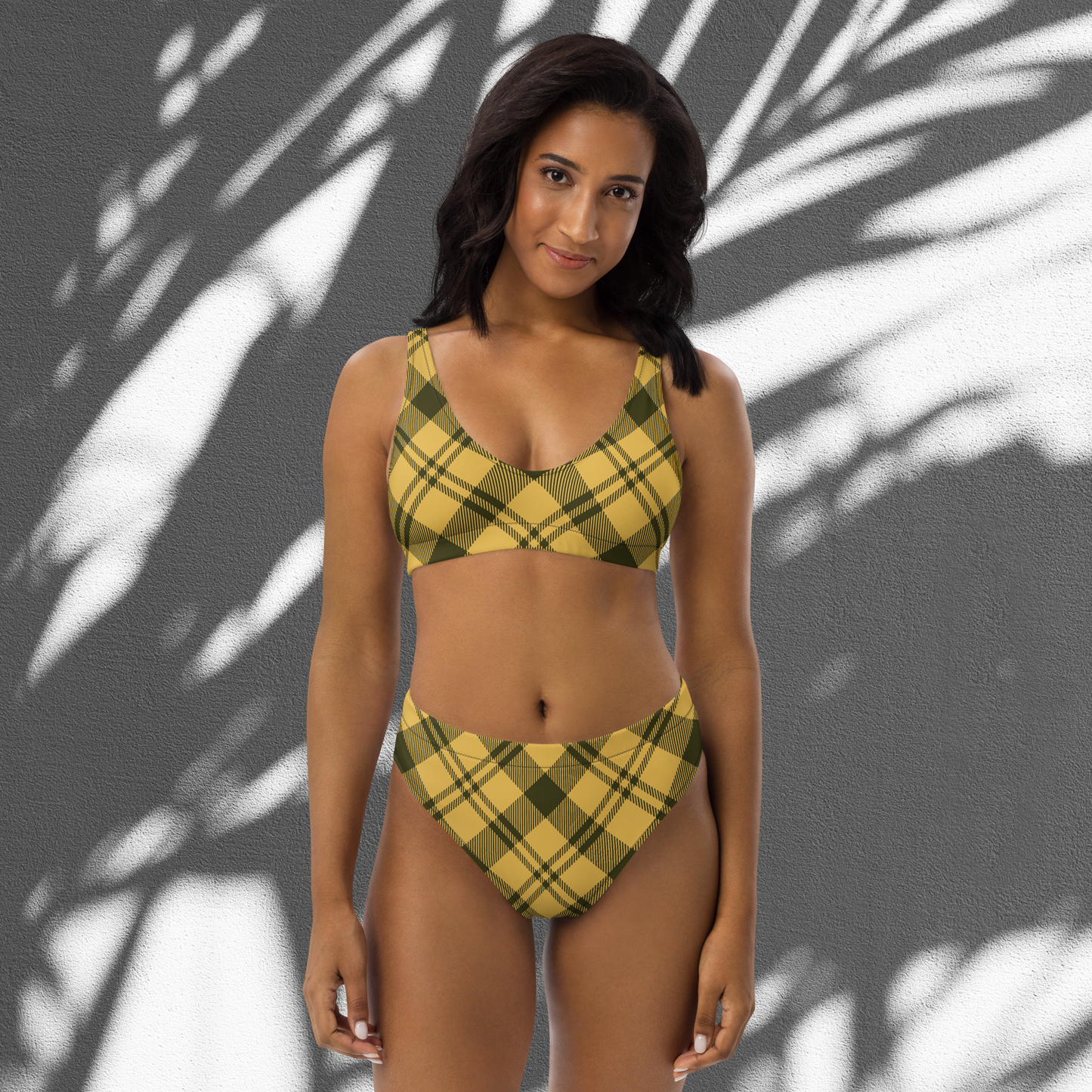 Black and yellow plaid women’s recycled high-waisted bikini set.