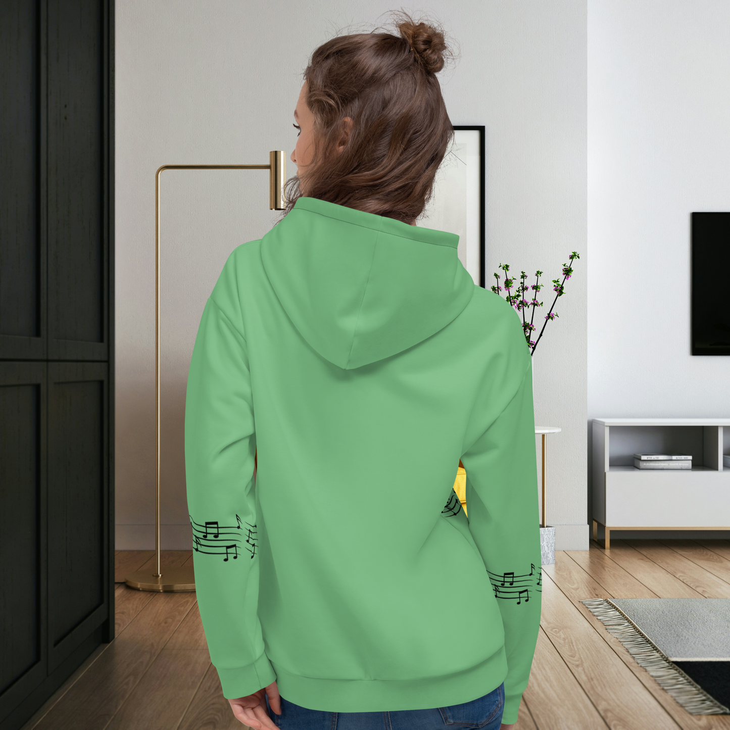 Sweat à capuche vert pour femme.