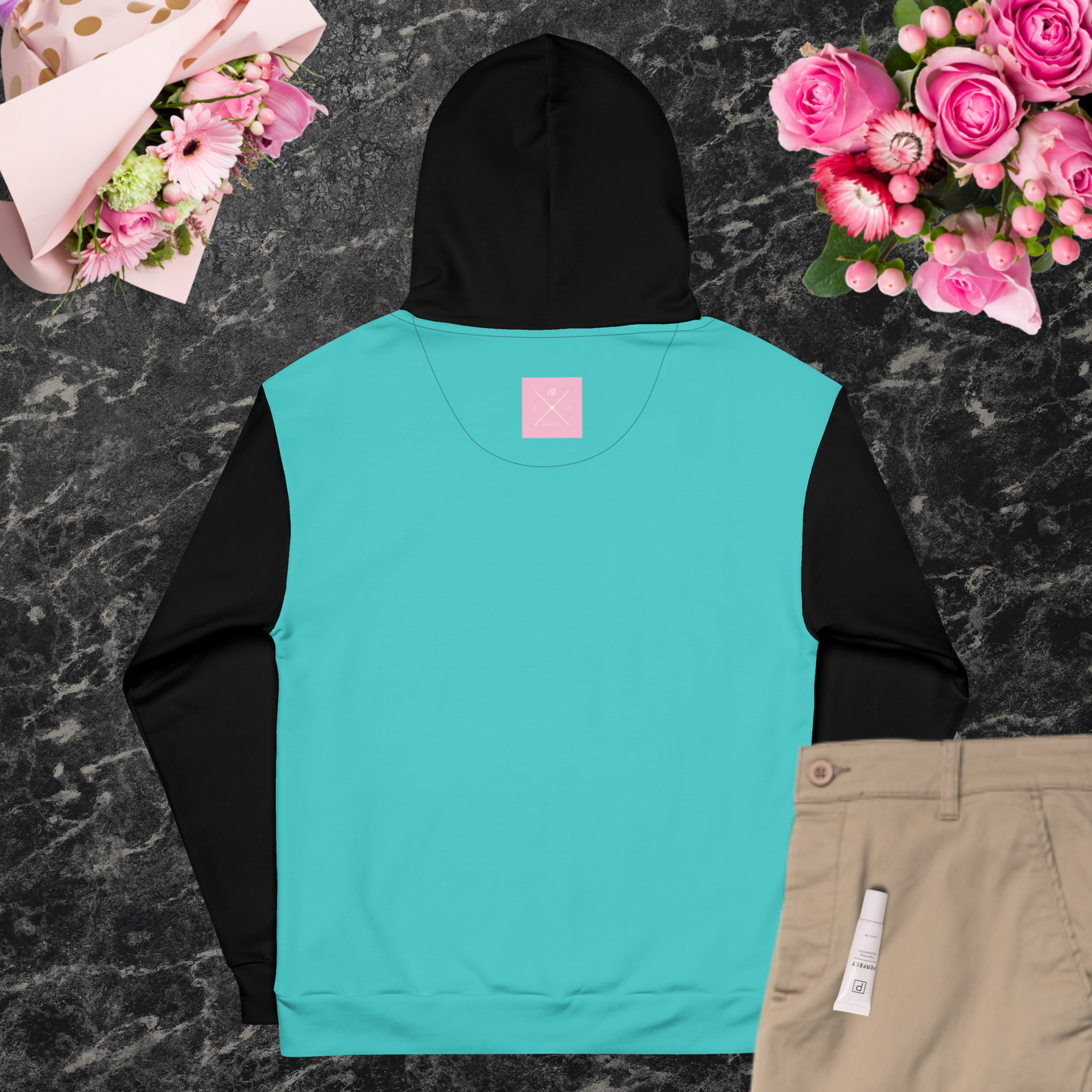 Turquoise back and multi-color women’s hoodie.