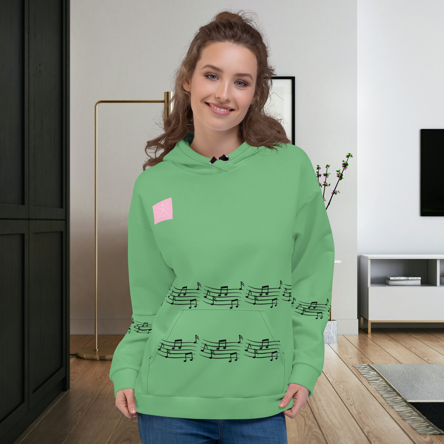 Sweat à capuche vert pour femme.