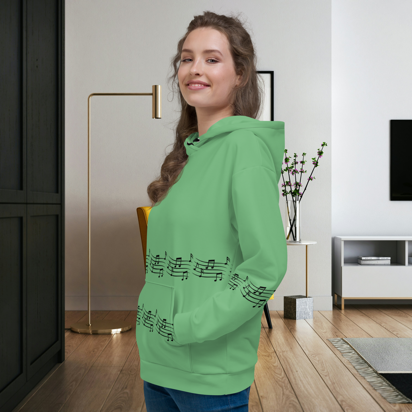 Sweat à capuche vert pour femme.