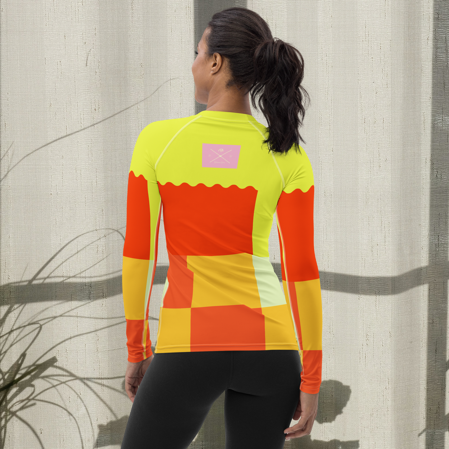 Yellow and multi-color women's rash guard.