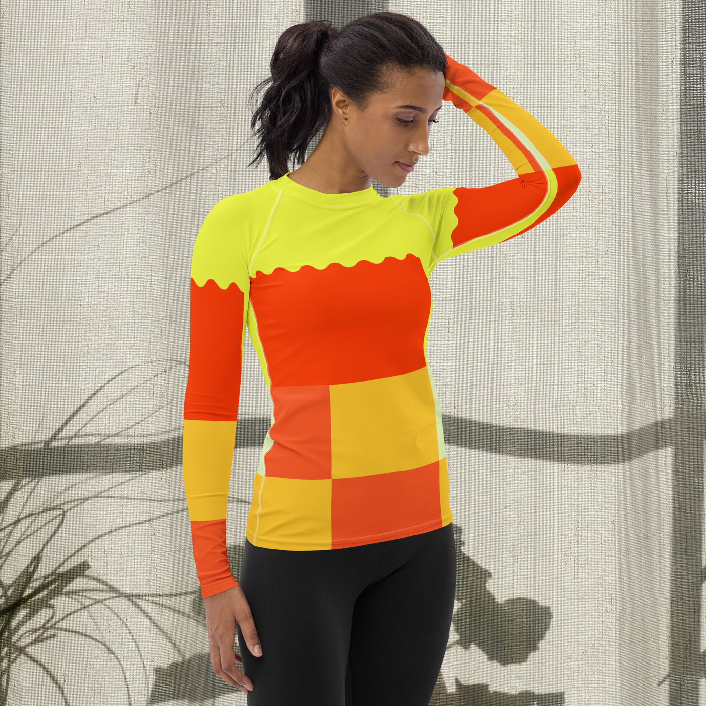 Yellow and multi-color women's rash guard.